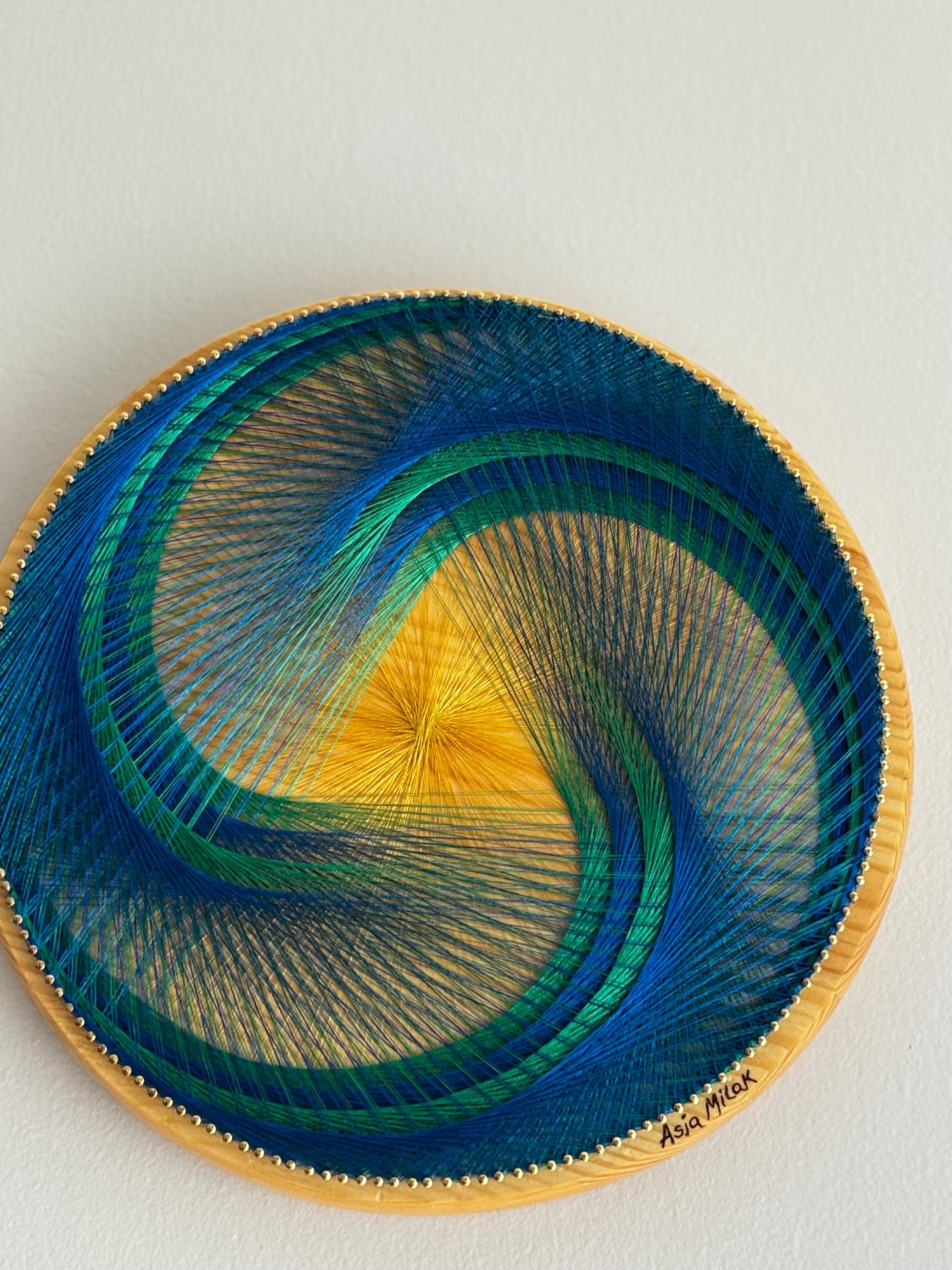 Geometric Spiral String Art: Blue, Green, and Yellow Fiber Wall Hanging ...