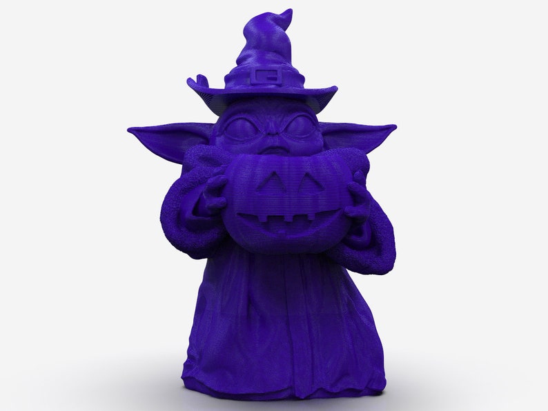 K&ouml;nnte beinhalten: Eine violette 3D-gedruckte Figur eines Charakters, der einen Hexenhut tr&auml;gt und einen K&uuml;rbis mit Fratze h&auml;lt.