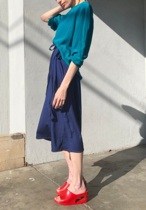 Minimalist silk blouse in teal