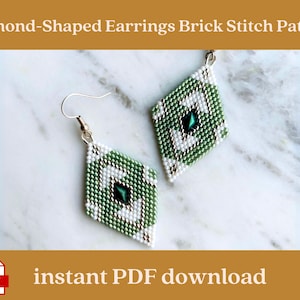 May include: A pair of diamond-shaped earrings with a green and white brick stitch pattern. The earrings have a silver hook closure and a green gemstone in the centre. The earrings are on a white marble surface.  "instant PDF download" is written in white text on a brown background.