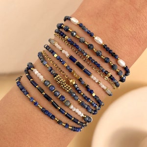 Bracelet made of stainless steel and natural stones LAPIS LAZULI semi-precious stones with golden charms