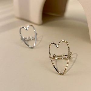 Adjustable stainless steel ring large thin openwork heart elongated smoothed
