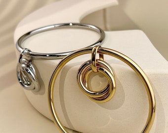 Bracelet jonc en acier inoxydable avec un jeton plaque breloque nœud croisé lissé argenté doré