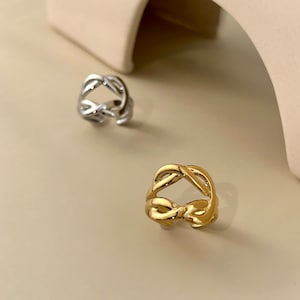 Adjustable stainless steel ring wide openwork double intertwined knots smoothed silver gold