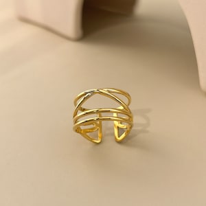 Stainless steel ring adjustable several rows crossed gold smoothed