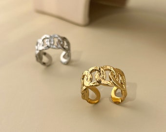 Adjustable stainless steel ring with large hammered link