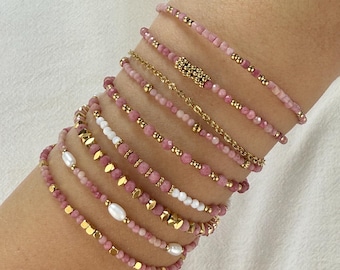 Stainless steel bracelet with natural rhodonite gemstones and gold charms