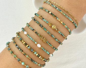 Stainless steel bracelet with natural African turquoise gemstones and gold charms