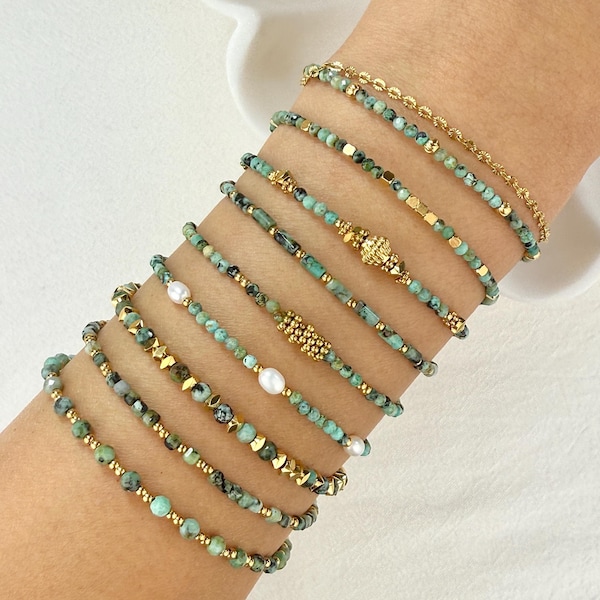 Stainless steel bracelet with natural African turquoise gemstones and gold charms