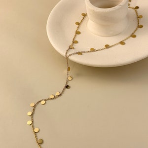 Fine stainless steel Y-shaped lasso necklace with round silver-gold medallion tassels