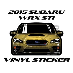 May include: A gold-colored 2015 Subaru WRX STI vinyl sticker. The image shows a front view of the car with black accents, headlights, and the text "2015 SUBARU WRX STI" above the car. The words "VINYL STICKER" are below.