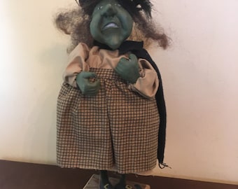 Green witch figurine