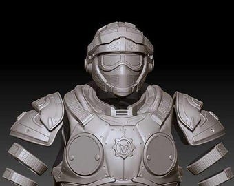 May include: A gray, detailed futuristic armor set, including a helmet with goggles, shoulder pads, chest armor with a circular emblem, and segmented arm guards. The design suggests a science fiction or cosplay theme.