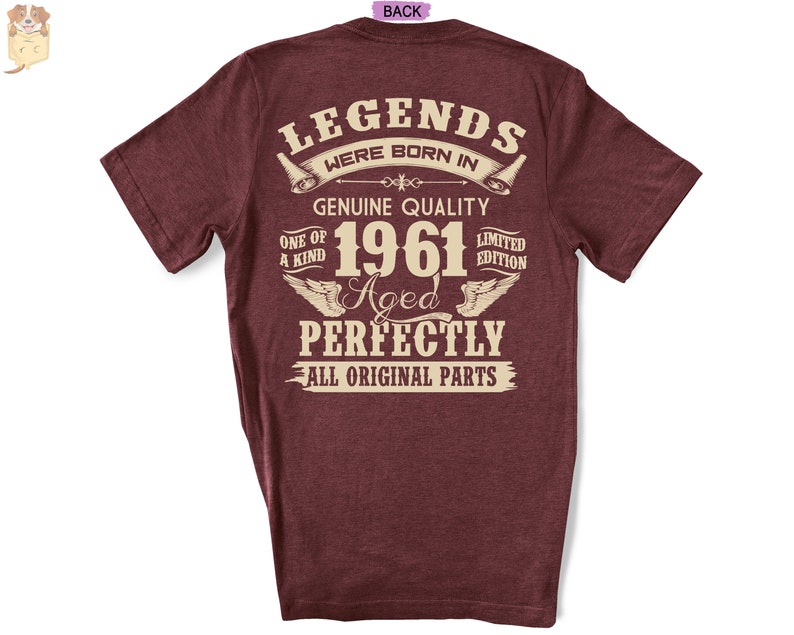 Op de afbeelding: Een maroon t-shirt met een vintage-stijl grafische afbeelding met de tekst "Legends Were Born In 1961 Aged Perfectly All Original Parts".