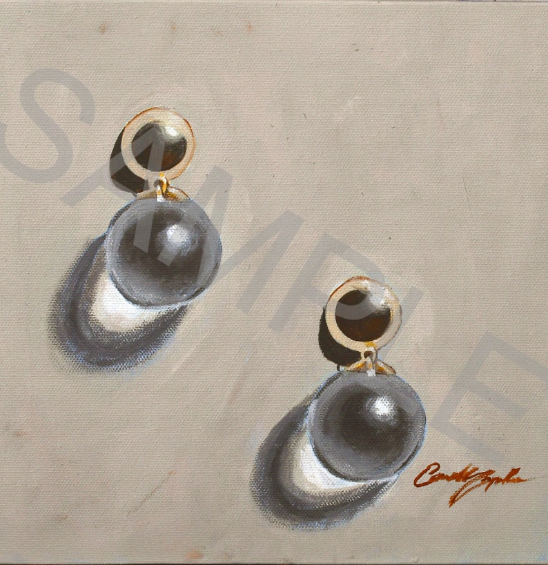 May include: A pair of gold earrings with large black pearl drops. The earrings are painted on a canvas background.