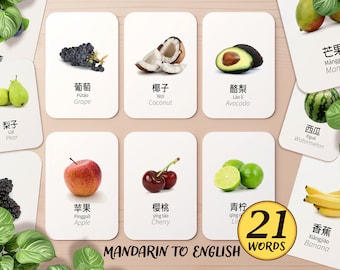 May include: Flashcards with images and Chinese characters for 21 different fruits, including mango, pear, grape, coconut, avocado, watermelon, apple, cherry, lime and banana. The text "MANDARIN TO ENGLISH WORDS" is at the bottom of the image.