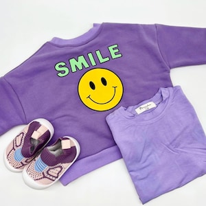 Confezione regalo per neonati viola: maglione, tutina e scarpe (da neonato a 24 mesi)