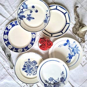 Mismatched old earthenware plates