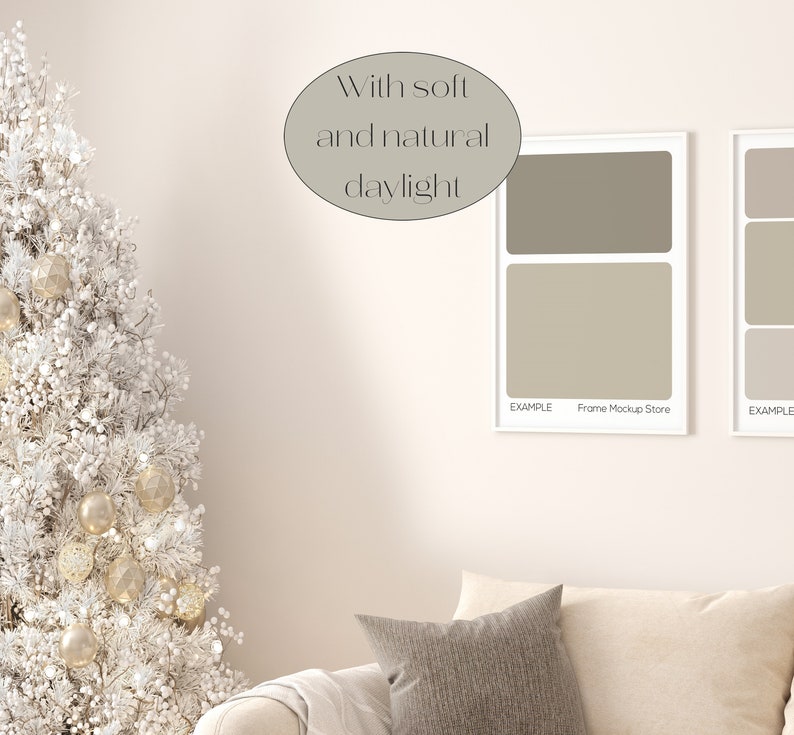 May include: A white Christmas tree decorated with gold ornaments and white flocking, a white couch with a gray throw pillow, and two white picture frames with gray and beige color swatches. The text "With soft and natural daylight" is written in a circle above the frames.