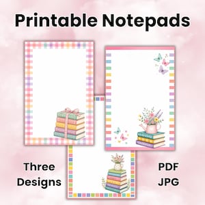 May include: Three printable notepads featuring white paper with colorful borders. One has a gingham border and a stack of books tied with a bow. Another has a striped border, butterflies, and a watering can on books. The third has a floral vase on books.