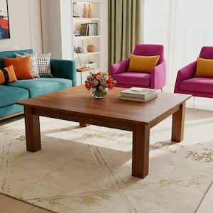 May include: A living room scene featuring a teal sofa with orange and yellow pillows, two magenta armchairs with yellow pillows, and a large brown square coffee table. A patterned rug and a vase of flowers complete the decor.