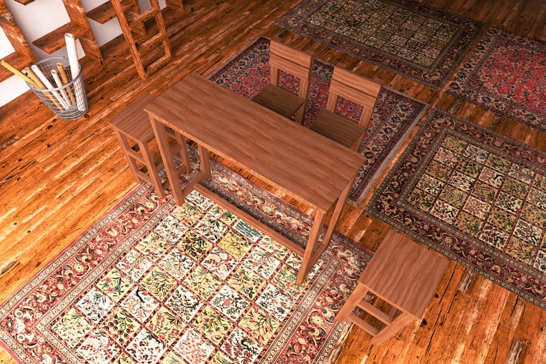 May include: A wooden desk with two matching chairs and two stools sits on a patterned rug. The rug has a floral design with red, green, and yellow accents. The room has a warm, inviting feel.