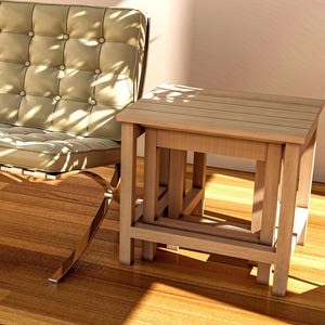 Here, there is a nestable End Table-Side Table or Nesting Coffee Table set consisting of 3 pieces, Large, Medium and Small, placed indoors.