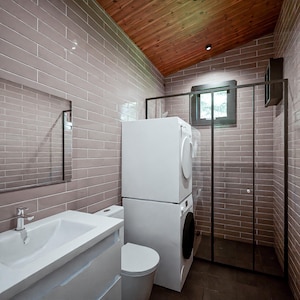 16x20 tiny house plans featuring a modern one-bedroom layout with open living room and kitchen, full bathroom with WC, and a spacious 200 sq ft covered porch with a sloped roof. DIY small house blueprint for affordable cabin, backyard guest house, minimalist living design, and easy construction. Printable architectural floor plan ideal for off-grid, ADU, or vacation tiny home builds.