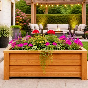 DIY raised planter box woodworking plans featuring a modern outdoor wooden planter with sturdy legs and clean horizontal slat design. Perfect for garden, patio, or backyard projects, this build showcases a durable and stylish raised garden bed ideal for flowers, herbs, or vegetables. Step-by-step DIY woodworking plans suitable for beginners and intermediate woodworkers looking to create a functional and decorative planter box.