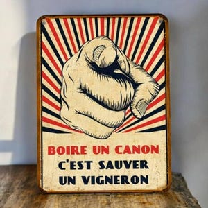 Vintage metal sign drinking a cannon