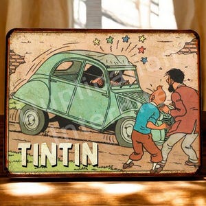 Vintage Tintin and the Thompsons metal sign