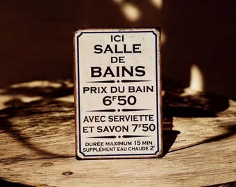 Vintage metal bathroom sign