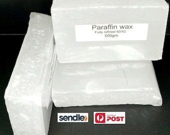 May include: Three white blocks of paraffin wax, each wrapped in clear plastic. The top block has a label that reads "Paraffin wax Fully refined 60/62 500gm".