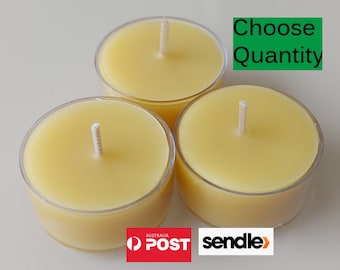 May include: Three yellow tea light candles in clear glass containers with white wicks. Choose Quantity.