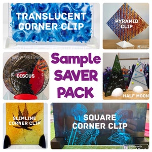 May include: A collage of six images showcasing different types of glass art pieces. The images include a translucent blue corner clip, a pyramid clip with a geometric pattern, a discus with a red and black design, a slimline corner clip with a maple leaf design, a square corner clip with a blue and black design, and two half-moon shaped glass ornaments. The text "Sample Saver Pack" is displayed in purple letters in the center of the collage.
