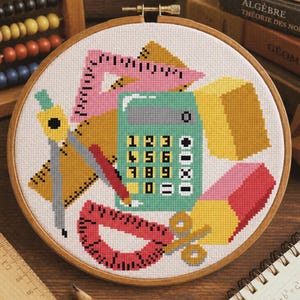 Patrón de punto de cruz matemático, diseño de útiles escolares