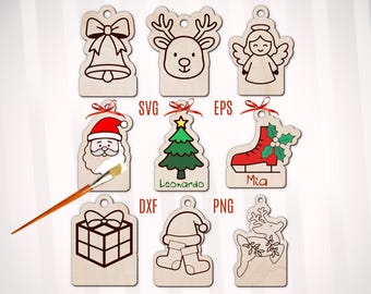 May include: Wooden Christmas ornament tags in various shapes, including a bell, reindeer, angel, Santa, Christmas tree, ice skate, gift box, hat and boots, and a deer. Some tags are colored with red and green accents. A paintbrush is shown applying paint to the Santa tag.