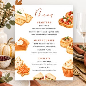 May include: A printed menu card featuring watercolor illustrations of food items including baked brie, bruschetta, pumpkin pie, leaf-shaped cookies, and a cupcake. The text lists starters, main courses, and desserts with descriptions in black font.