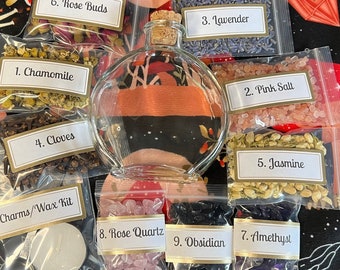 May include: A collection of dried herbs, crystals, and a glass bottle with a cork stopper. The herbs are labeled with numbers and names: 1. Chamomile, 2. Pink Salt, 3. Lavender, 4. Cloves, 5. Jasmine, 6. Rose Buds. The crystals are labeled: 7. Amethyst, 8. Rose Quartz, 9. Obsidian. The bag labeled "Charms/Wax Kit" contains a small white disc and a spoon.