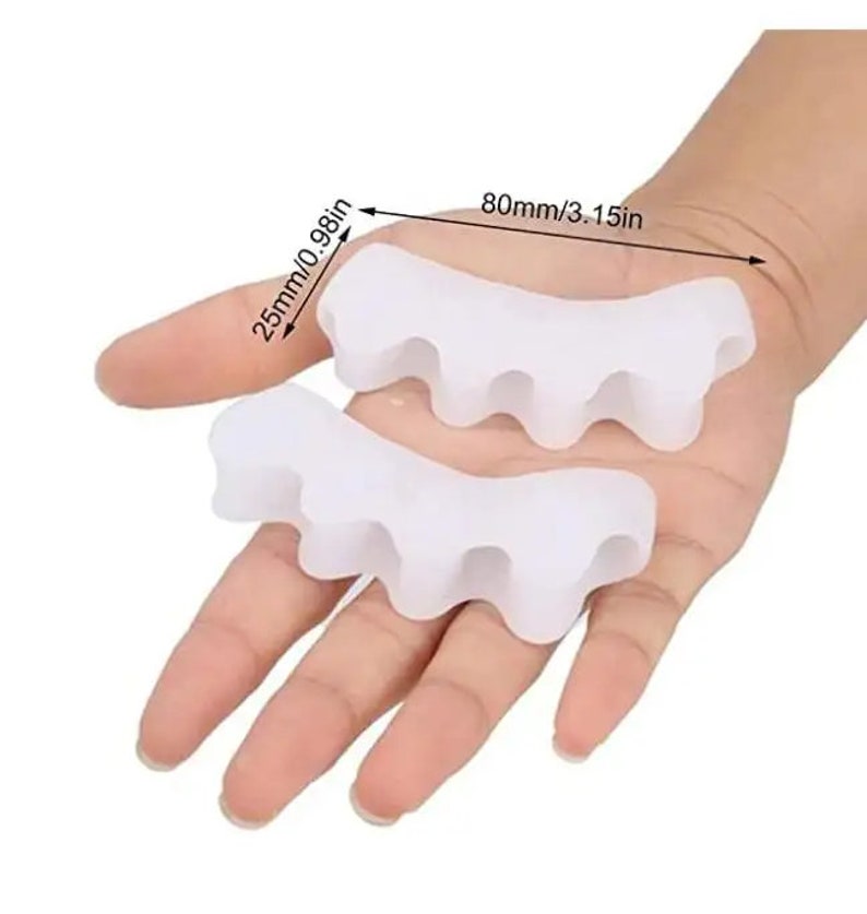May include: Two white silicone toe separators, designed to help with bunions and hammertoes. The separators are 3.15 inches long and 0.98 inches wide.