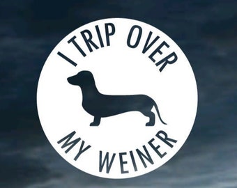 I Trip Over My Weiner Vinyl Decal - FREE SHIPPING! - decorative decal for car, windows, glass, mugs, laptops, etc.