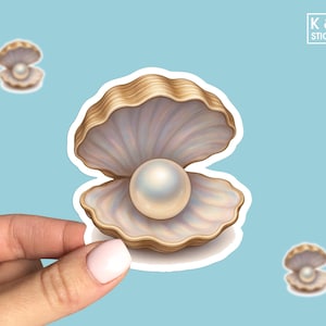 May include: A sticker featuring a detailed illustration of an open seashell with a large, lustrous pearl inside. The shell has a beige and white color scheme, with a pearlescent interior. The background is a light blue. The sticker has the text "K & O STICKERS".