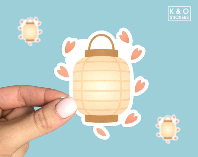 Minimalist kawaii-style paper lantern sticker with soft beige tones and floating peach hearts on a pastel blue background — perfect for cozy aesthetic decor, Japanese-inspired collections, or calming light-themed sticker designs.