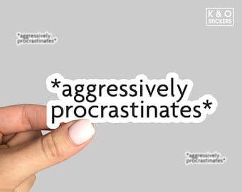 May include: A die-cut vinyl sticker featuring the black text *aggressively procrastinates* in a sans-serif font on a white background. The sticker has a clean white border around the lettering, which is presented in two lines.