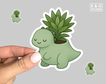 Cute Dino Succulent Planter Sticker – Kawaii Dinosaur Plant Pot Vinyl Decal for Laptop, Water Bottle, Journal
