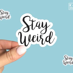 Stay weird laptop stickers