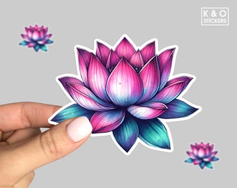 May include: A sticker featuring a pink and blue lotus flower with a white outline. The flower is drawn in a realistic style with detailed petals and leaves.