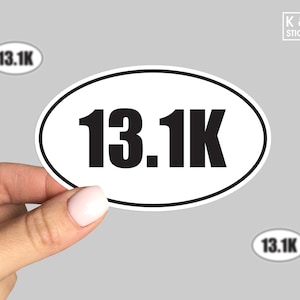 May include: White oval sticker with black text that reads "13.1K".