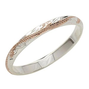 May include: A thin silver band with a rose gold inlay and an engraved floral design.