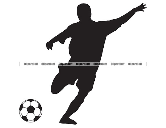 pro soccer player kicking ball